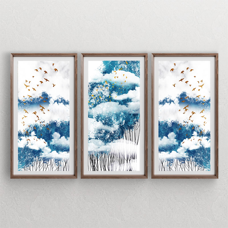 ست سه تابلوی دکوراتیو از منظره آبی با طرحهای درخت های جنگلی و ابرهای سفید