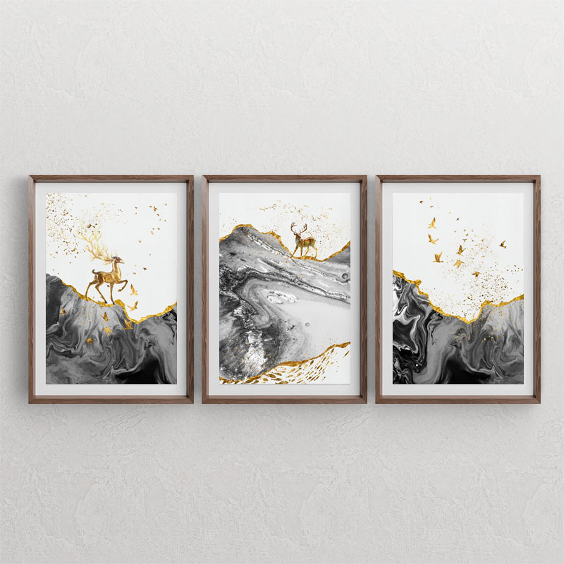 ست سه تابلوی دکوراتیو از منظره با طرح صخره ها و تپه های سیاه با افکت های طلایی و گوزن و پرنده